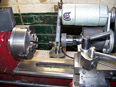 A Unimat spindle and headstock configured as a tool post grinder